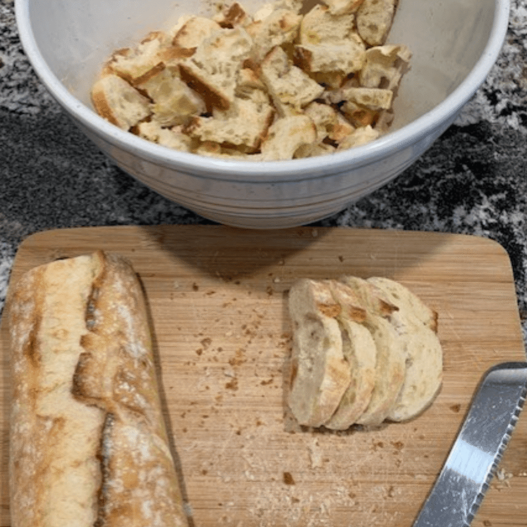 Preparing croutons on a cutting board