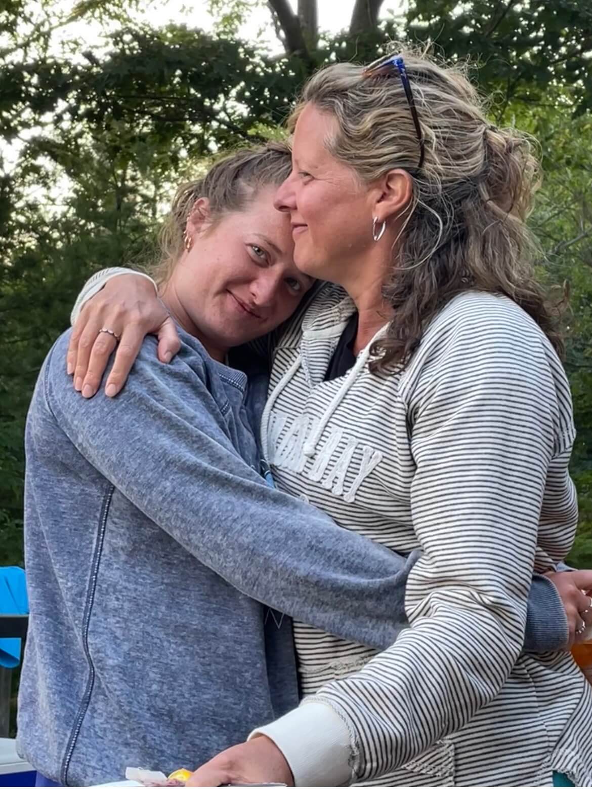 Mother and Daughter embrace