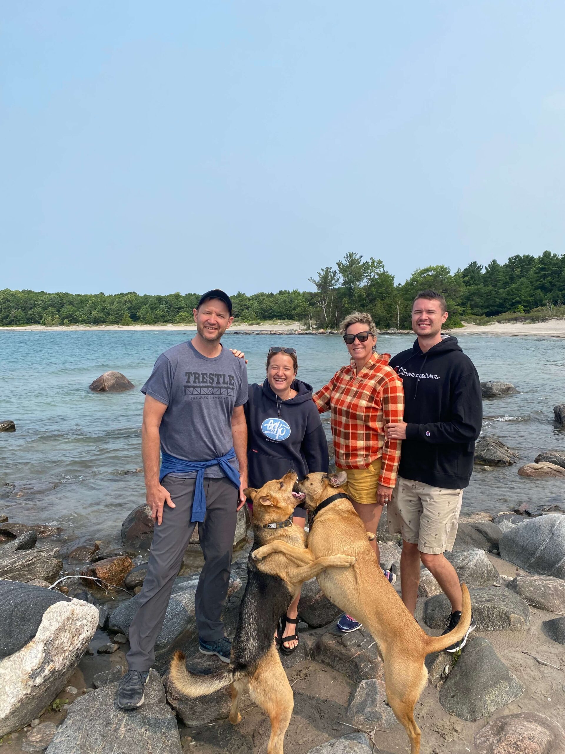Family on a rocky beach